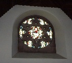 Small stained glass window in St Michael's Church.